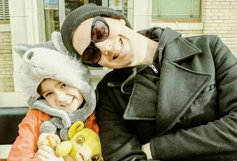 Image: City, O' City employee Brian Ball and his daughter.