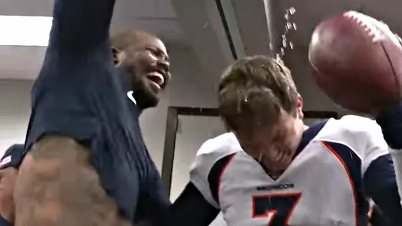 Image: Quarterback Drew Lock getting doused after the Broncos' victory over the Houston Texans.