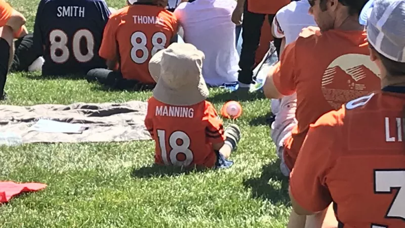 Image: One of the smallest fans at Broncos training camp was nostalgic for the good old days of 2016.