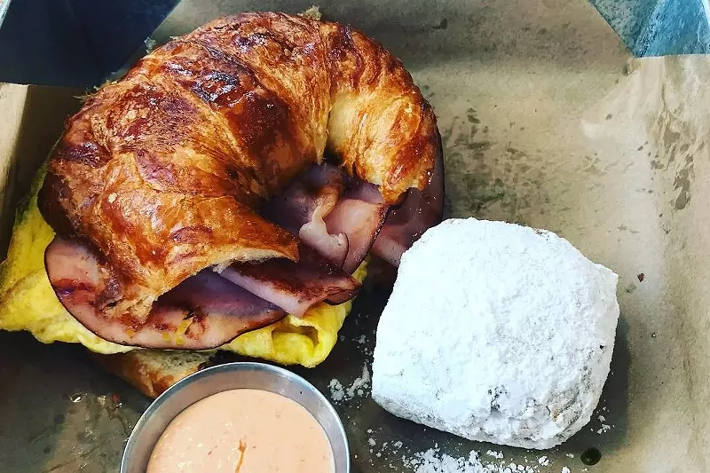 Image: The City French breakfast sandwich is made on a house croissant.