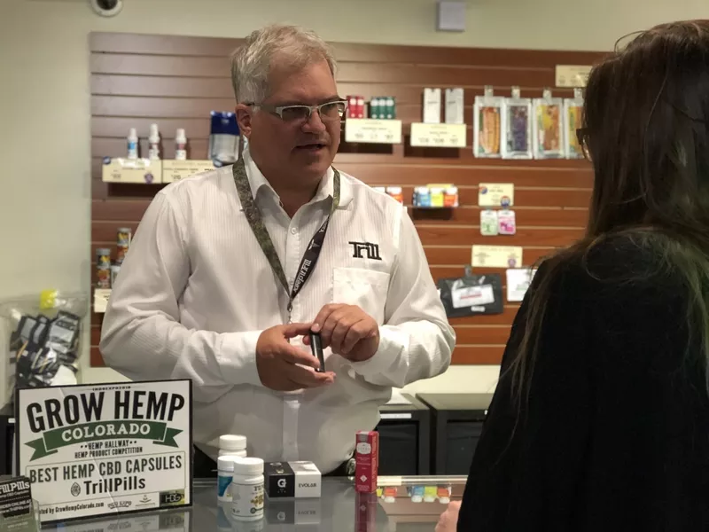Image: Trill Evolutions owner David Threlfall demonstrates products for a customer.