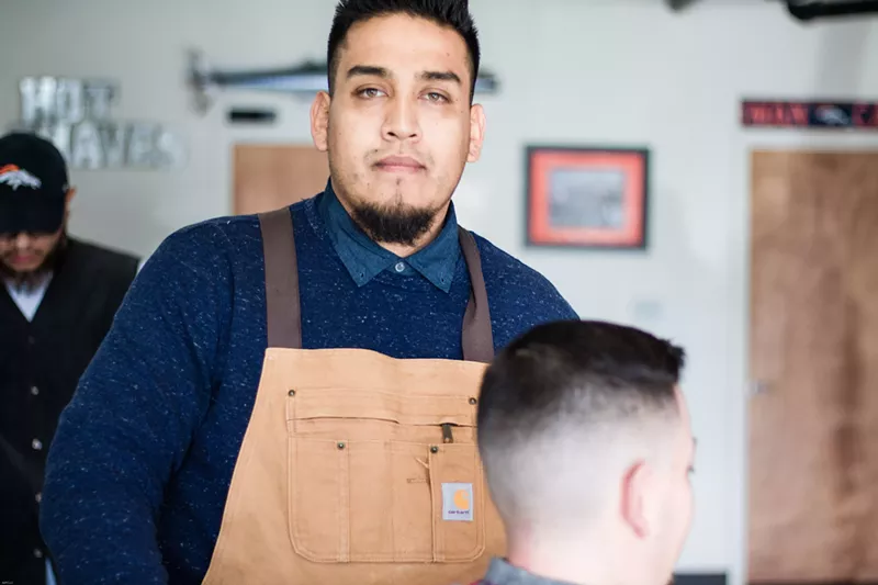 Image: Anthony Gallegos at AJ's All American Barbershop.