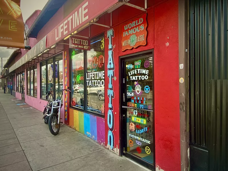 Image: A sidewalk view of Lifetime Tattoo