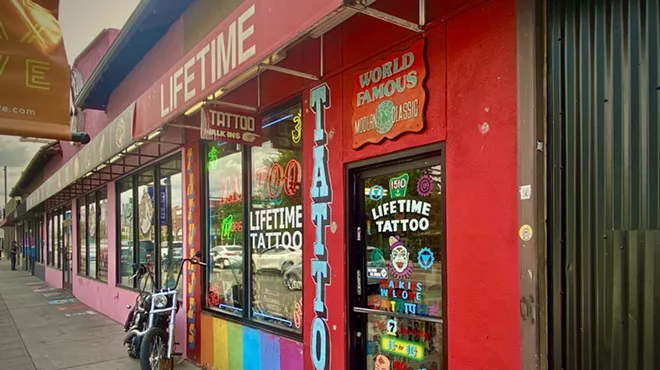 A sidewalk view of Lifetime Tattoo