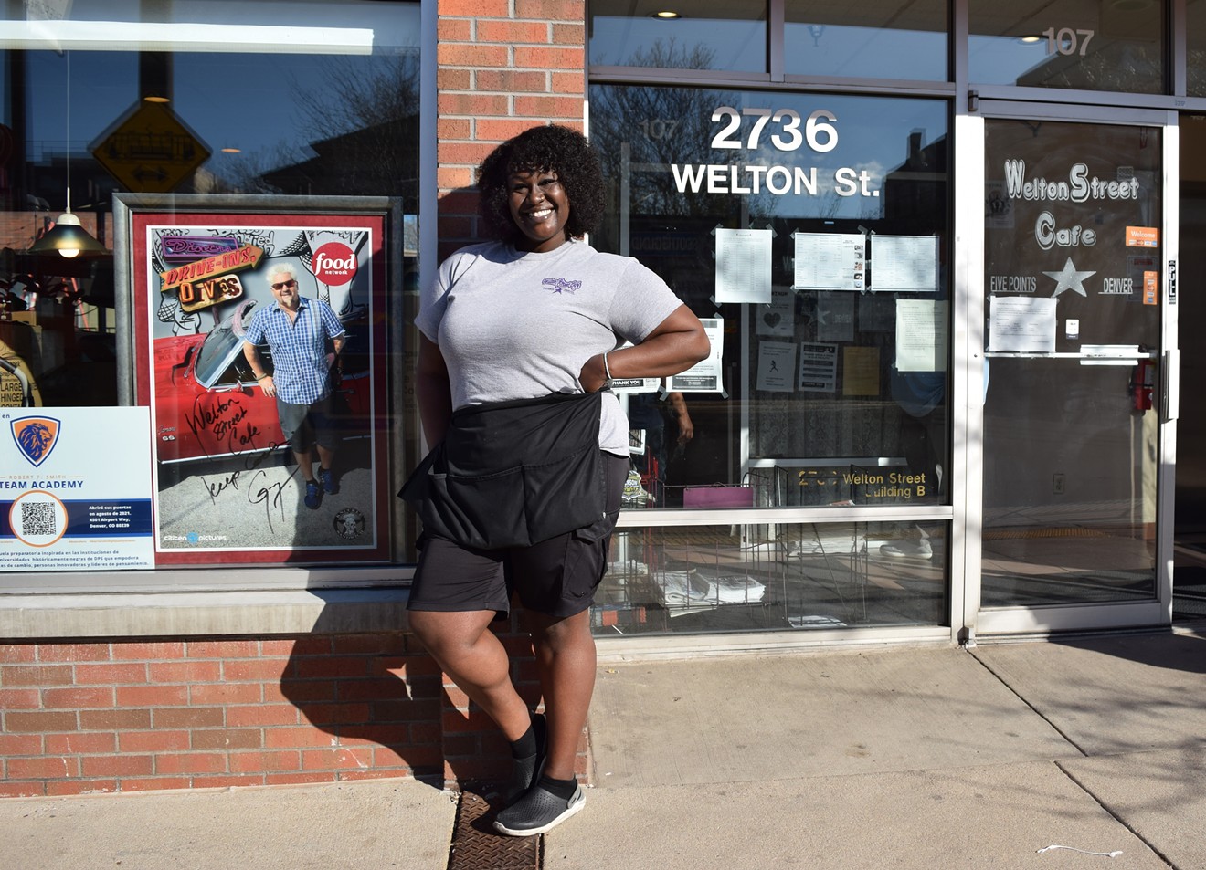 Fathima Dickerson stands outside the Welton Street Cafe, founded by her parents.