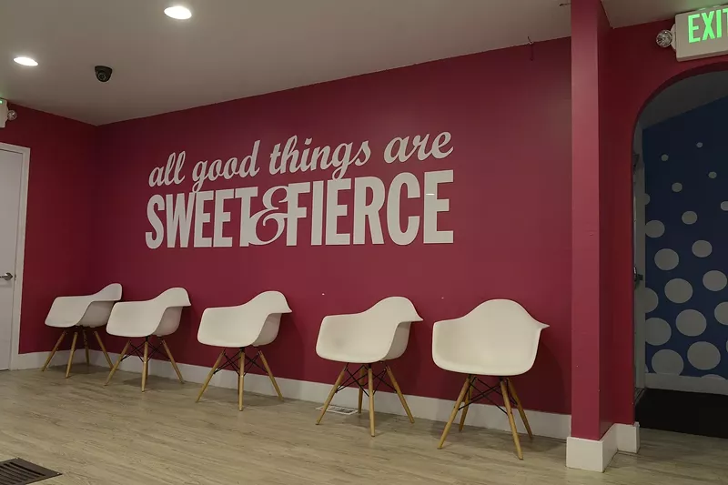 Image: The waiting room inside Sweet Leaf's dispensary on East Evans Avenue.