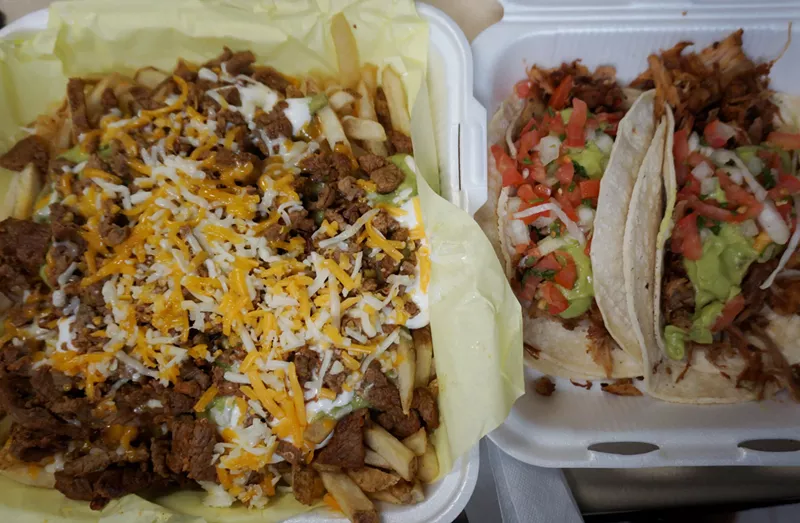 Image: Carne asada fries fill the late-night bill at Los Compas.