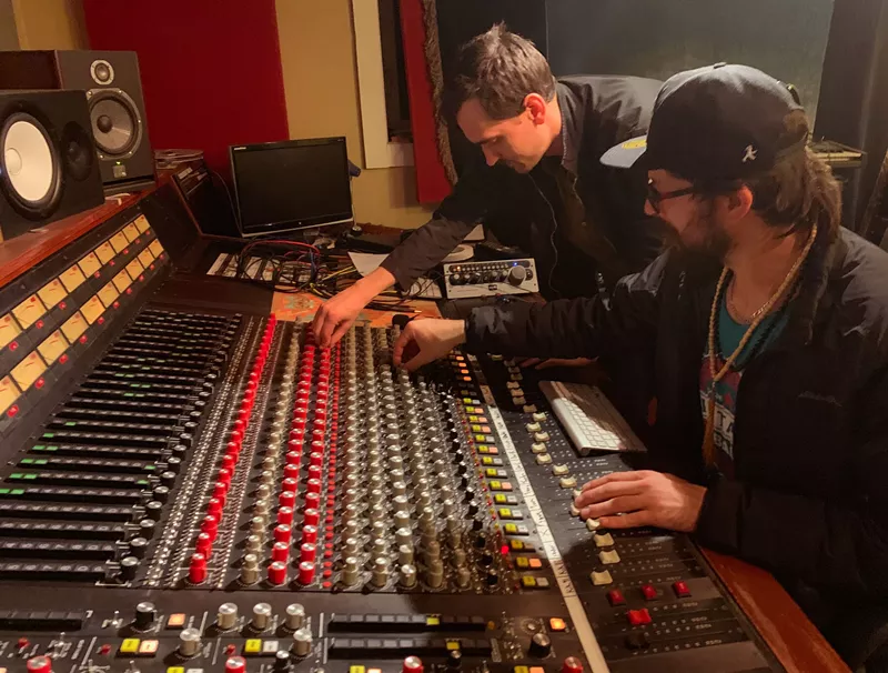 Image: Matt Tanner and Brent Somermeyer working on their one-of-a-kind analog mixing console.