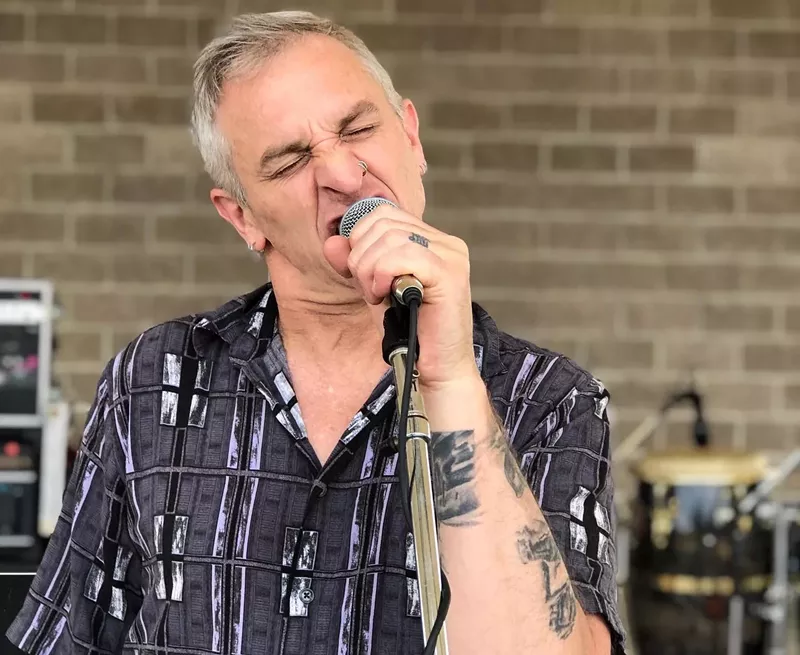 Image: Chad "Chadzilla" Johnson performing at Clement Park in a Doobie Brothers tribute band in early June 2019.