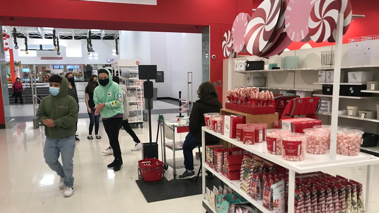 A customer checkpoint at the mall entrance to the Target at Colorado Mills, which has not suffered a COVID-19 outbreak.