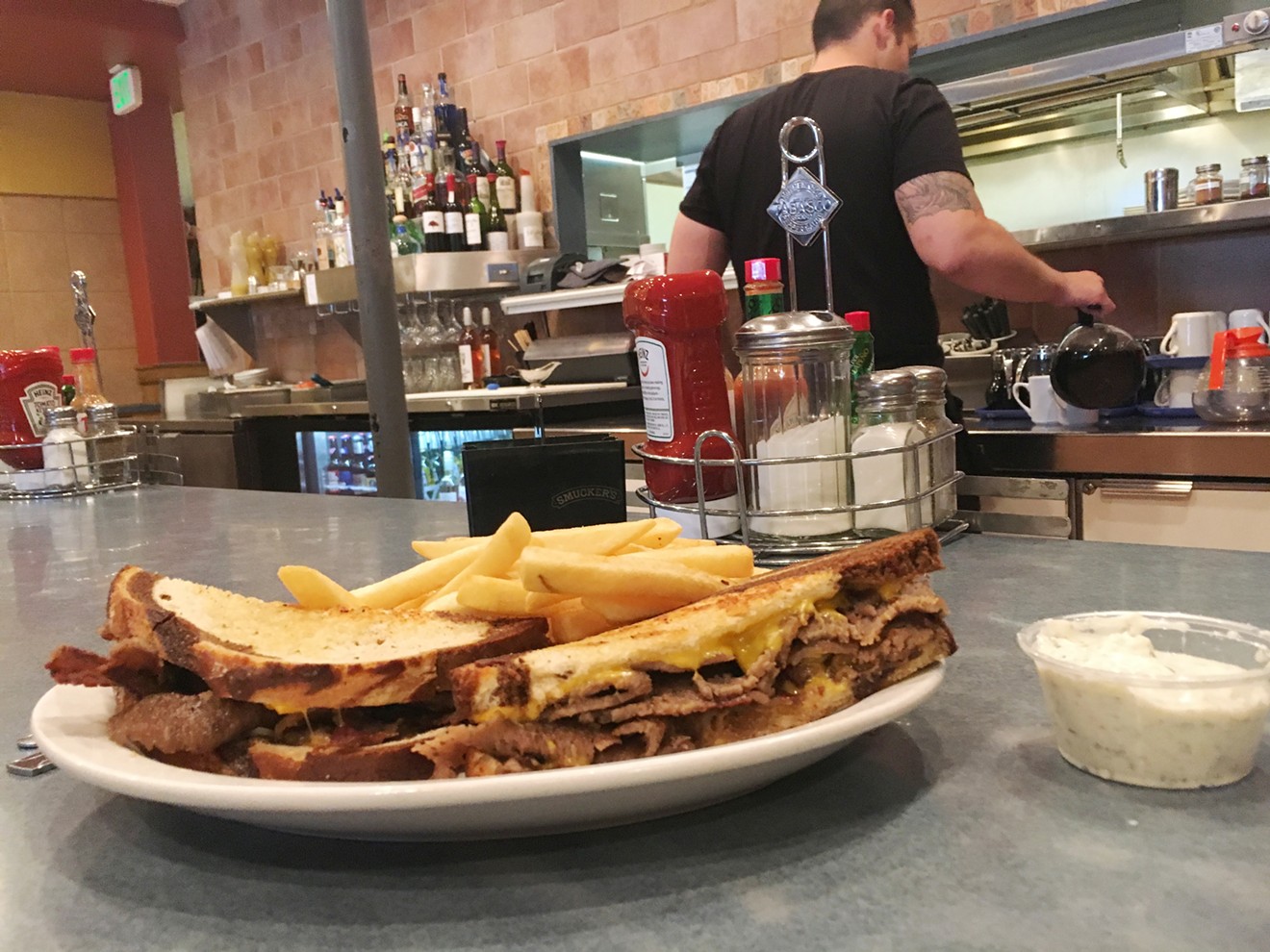 Diner classics like this gyros melt (with a side of tzatziki for the fries) can be found at Chef Zorba's.