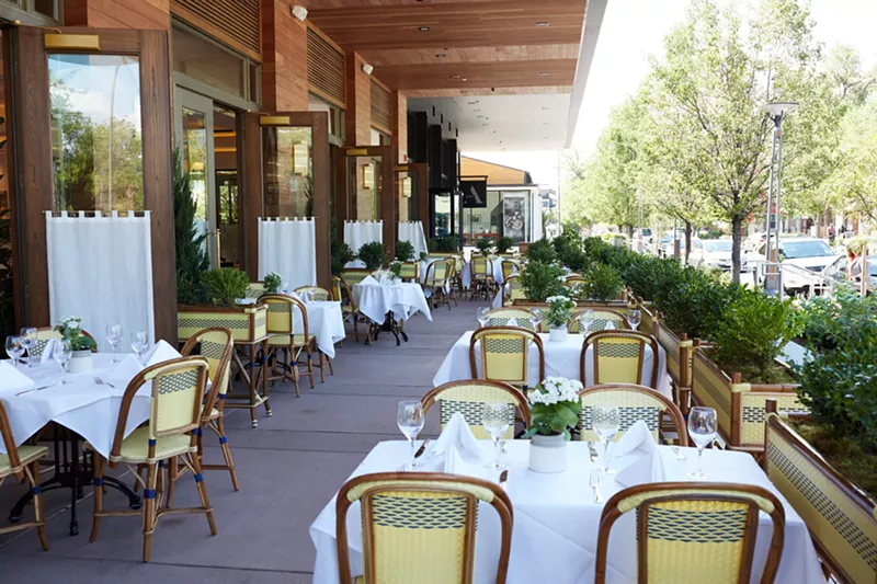 Image: Even the patio tables at Le Bilboquet have white tablecloths.