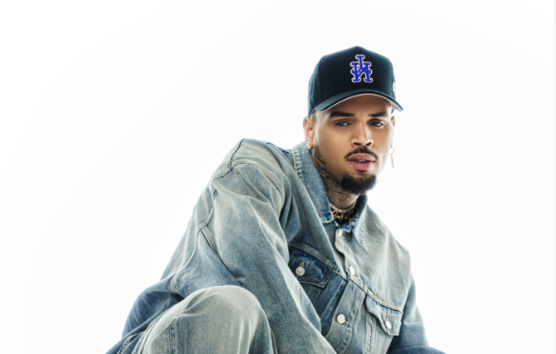 Image: man wearing a hat and jean jacket