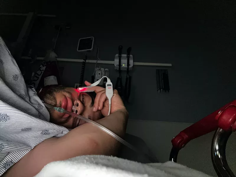 Image: Man in hospital bed