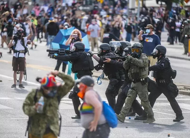 Image: An image from our May 30 slideshow "Curfew, Law Enforcement Clear Out Protesters on Day Three."