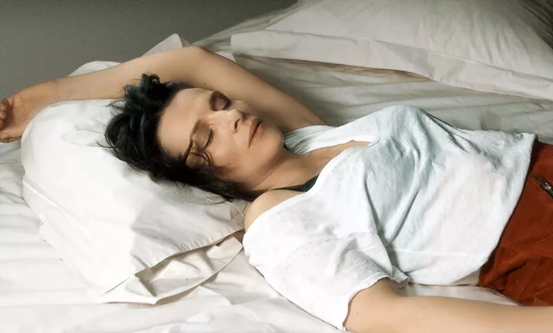 Image: In director Claire Denis's Let the Sunshine In, Juliette Binoche plays Isabelle, a middle-aged, divorced painter who seemingly lives comfortably in Paris while orbiting a half-dozen or so potential partners.
