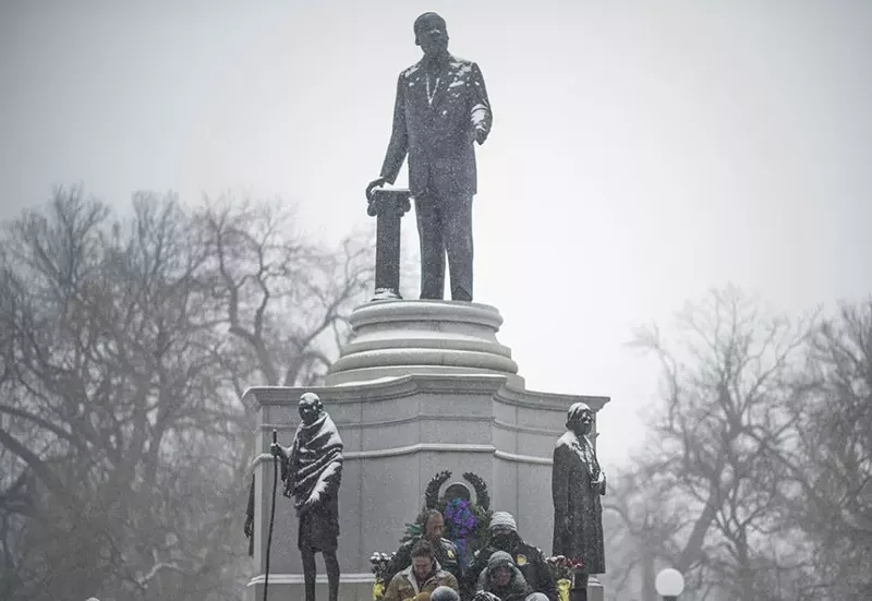 Image: sc\culpture of MLK in the snow.