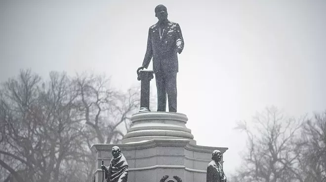 sc\culpture of MLK in the snow.