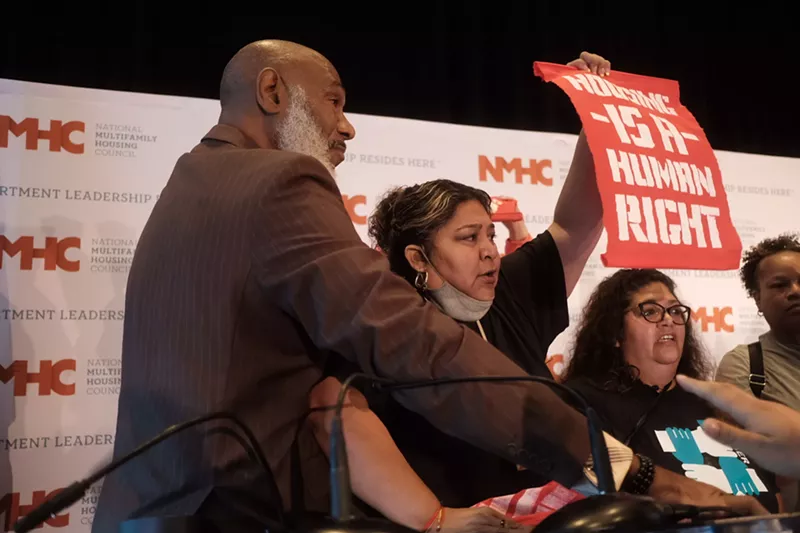 Image: Christina Morales (right) rallied for tenant rights in Washington, D.C.