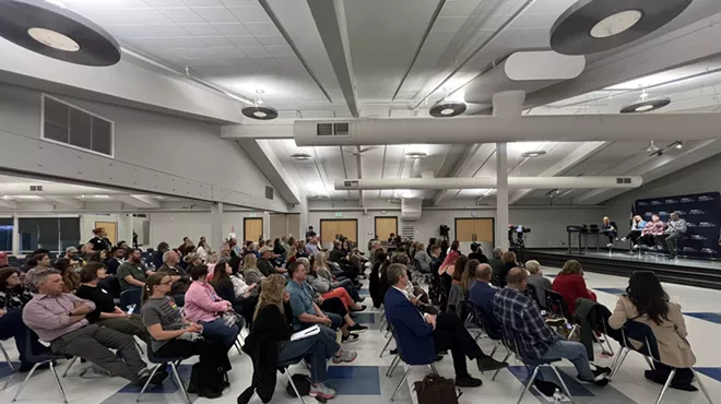 crowd of people at transgender meeting