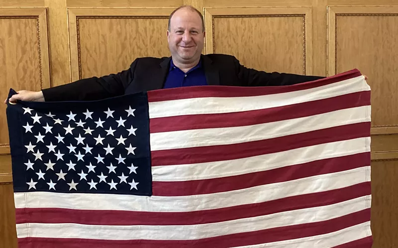 Image: The American flag flying over the State Capitol Building through June 13 is made of hemp.