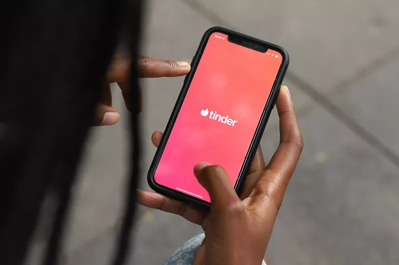 Image: Tinder dating app open on an iPhone