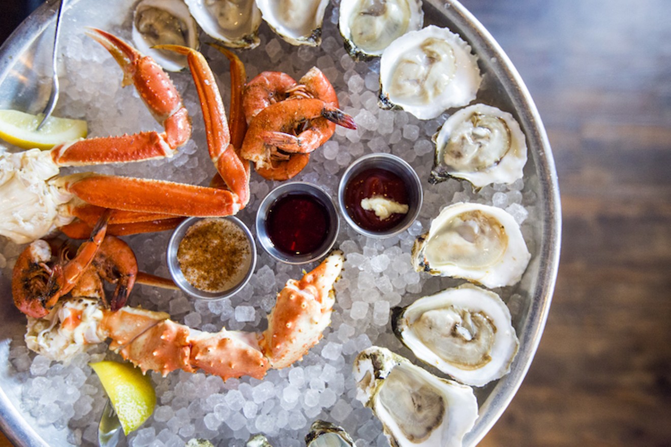A platter of crab legs, oysters and shrimp at Jax Fish House & Oyster Bar.