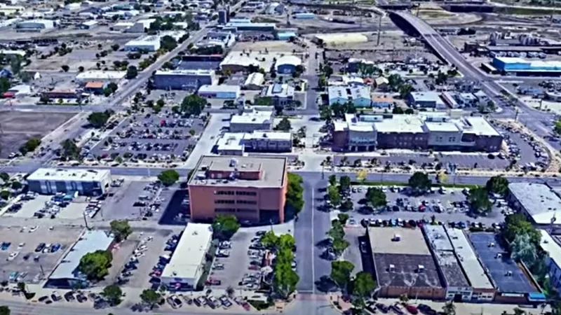 Image: An aerial look at Grand Junction, population center of Mesa County, which is receiving national attention for rising case and hospitalization rates and a poor vaccination record.