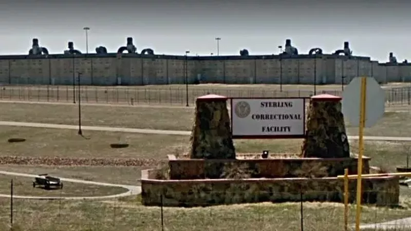 Image: The entrance to the Sterling Correctional Center, where ten inmates have died of COVID-19.