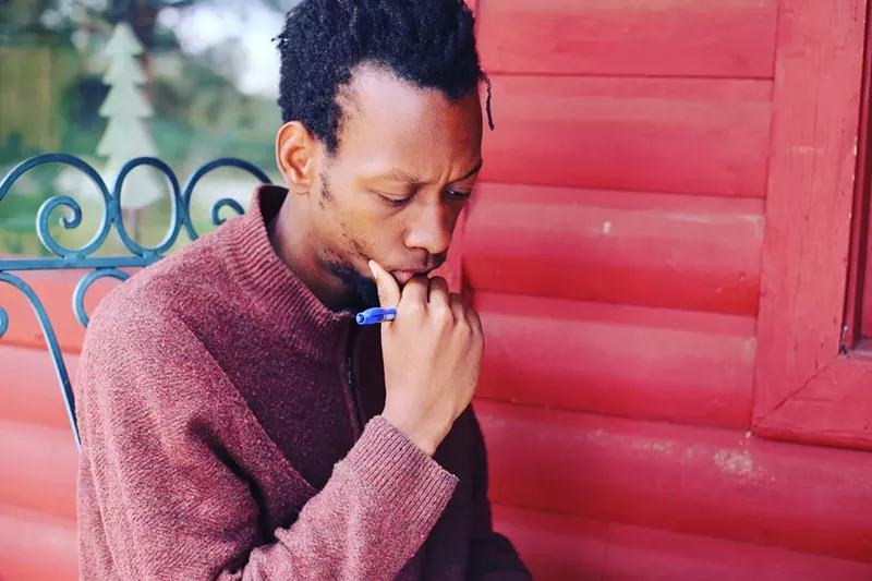 Image: Brenton Weyi working on his manuscript at the inaugural Lighthouse Writing in Color retreat.