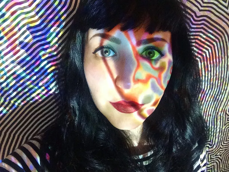 Image: Kellye Eisworth, self-portrait (standing inside Chris Bagley's piece from RedLine's 2017 MoP show).