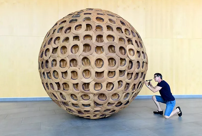 Image: Terry Maker, “Cowgirl Hat Ball,” 2019; wood structure, straw hats.