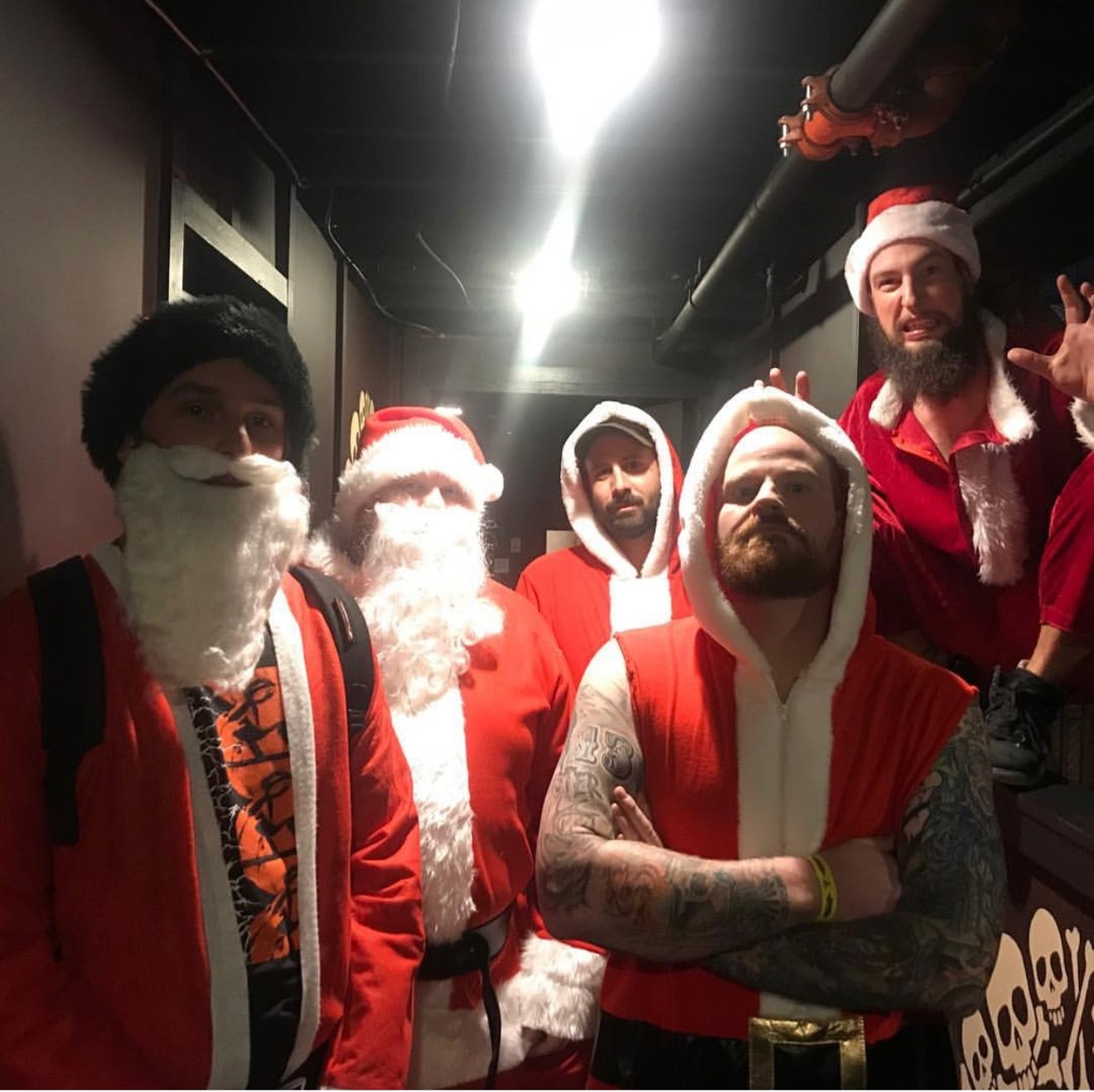 Members of Denver's Burial Plot donned Santa suits for a charity show at the Marquis Theater last year. They plan to do it again on December 21.