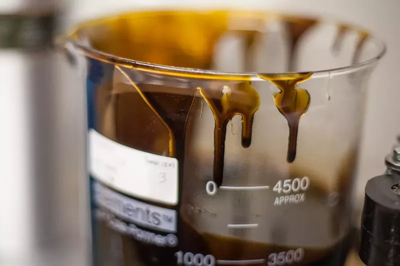 Image: CBD crude oil is an early form of hemp-derived CBD concentrate that requires further purification.
