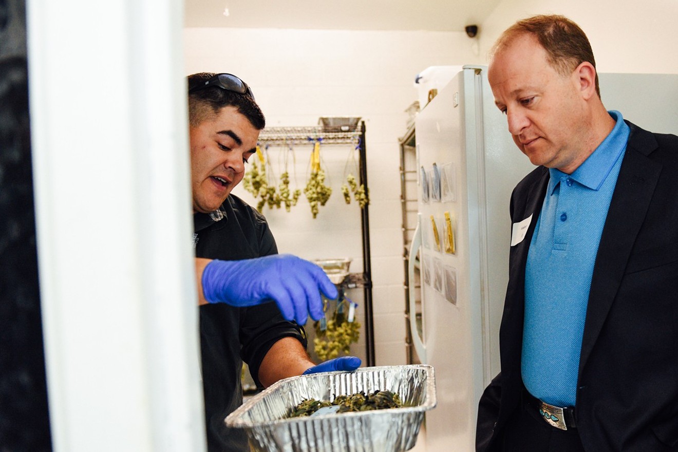 Colorado Governor Jared Polis tours Bgood, a Northglenn dispensary, before taking office in 2018.