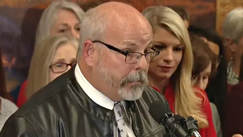Image: Tom Sullivan at a press conference about the recall effort that targeted him.