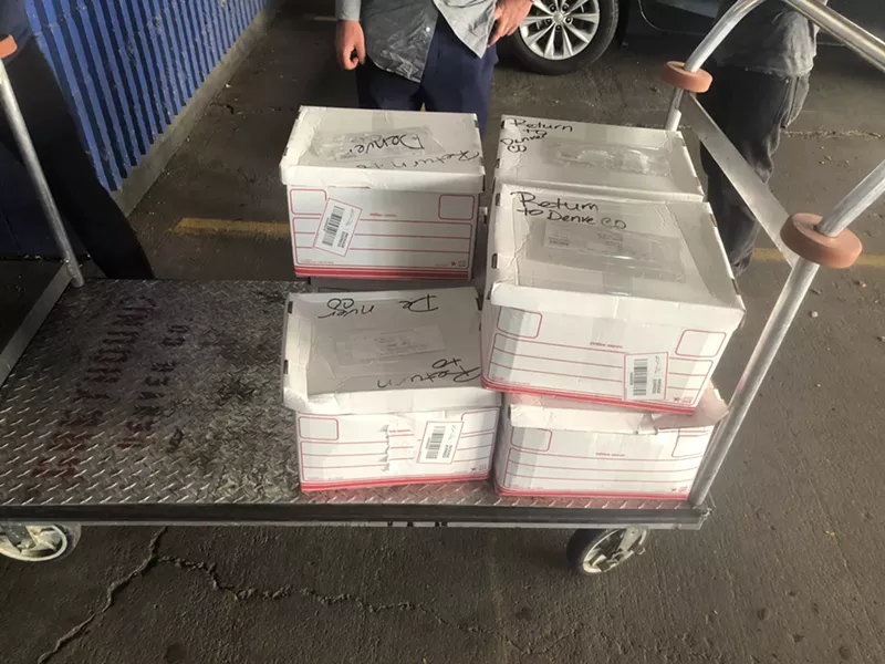 Image: Seven boxes of petition signatures were returned to Colorado Rising on Thursday.