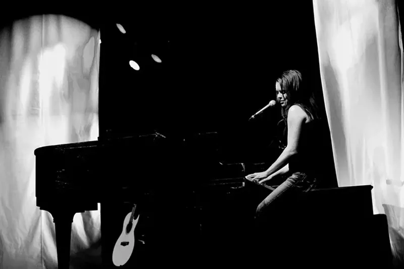 Image: Colorado singer Coles Whalen performing at a piano