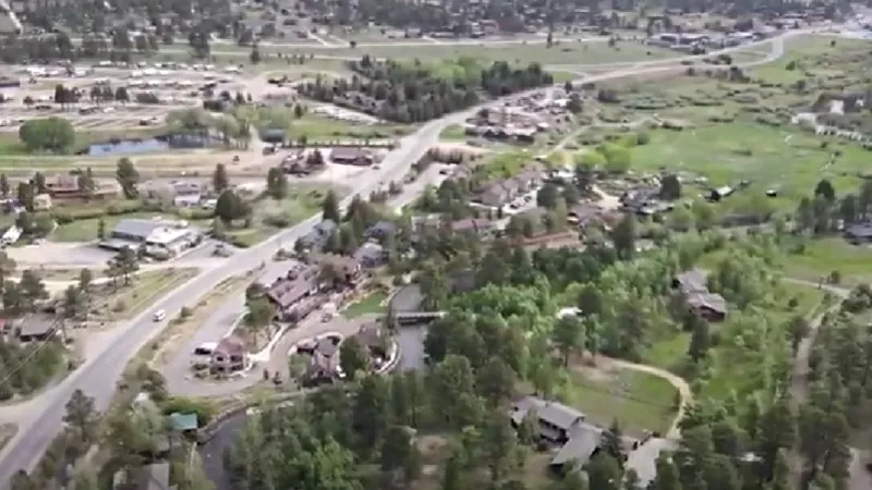 Image: An aerial view of Estes Park, one of three areas in Colorado where the new COVID-19 variant has been detected thus far.