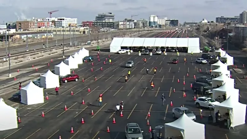 Image: A look at a mass vaccination event at Coors Field on January 30.