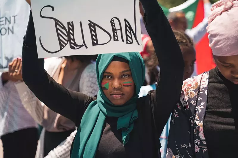 Image: A protester at the June 8 demonstration in Civic Center Park.