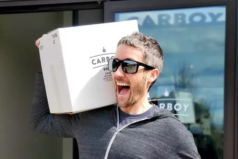 Image: Kevin Webber, Carboy Winery director of sales and business development, demonstrates the joy of to-go wine.