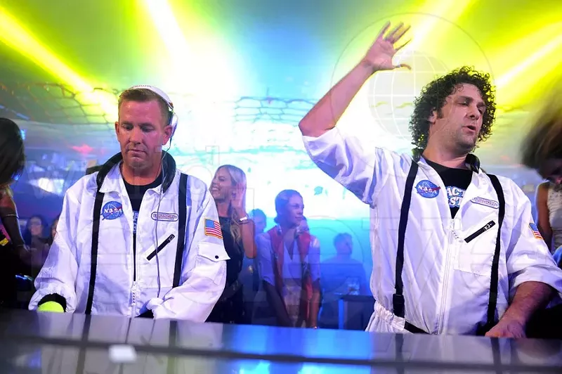 Image: two djs performing