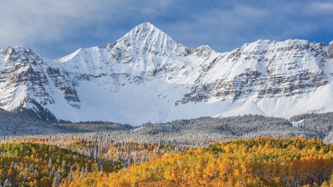colordado mountain with snow, golden aspen