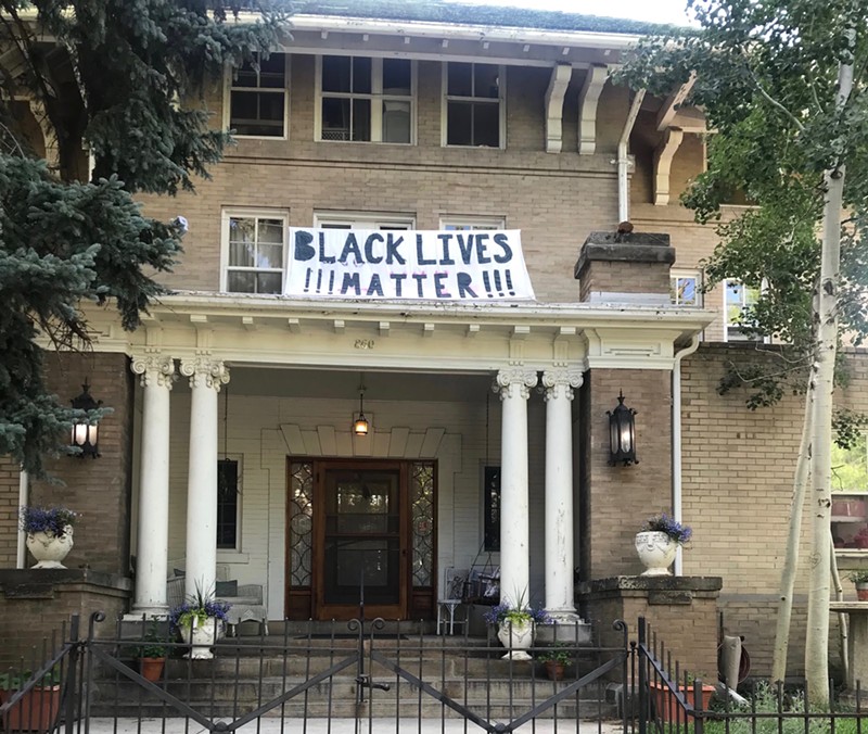 A Black Lives Matter banner that Cornerstone Apartments demanded be taken down at 860 Emerson Street
