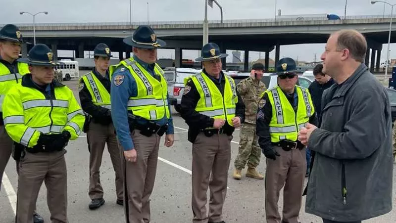Image: Governor Jared Polis meeting with first responders earlier this month.
