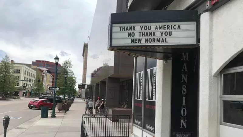 Image: A sign on view in downtown Colorado Springs last month.