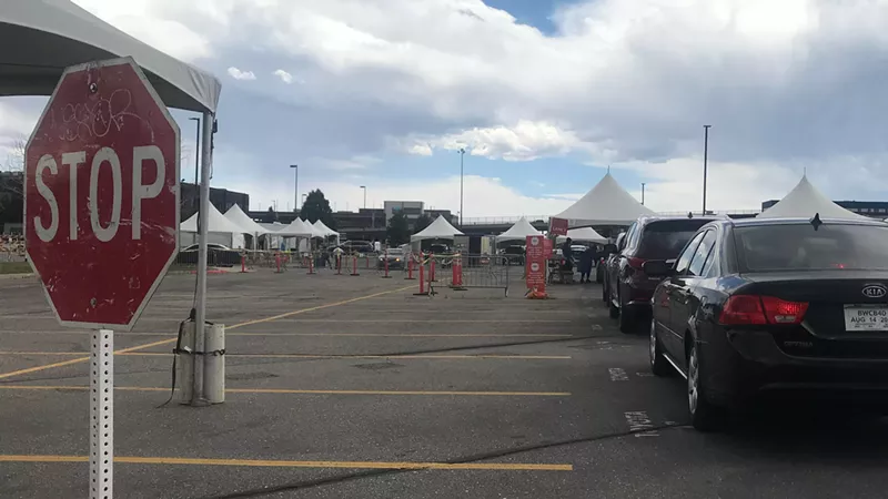Image: Lane one leading to a testing tent at the Pepsi Center on July 7.