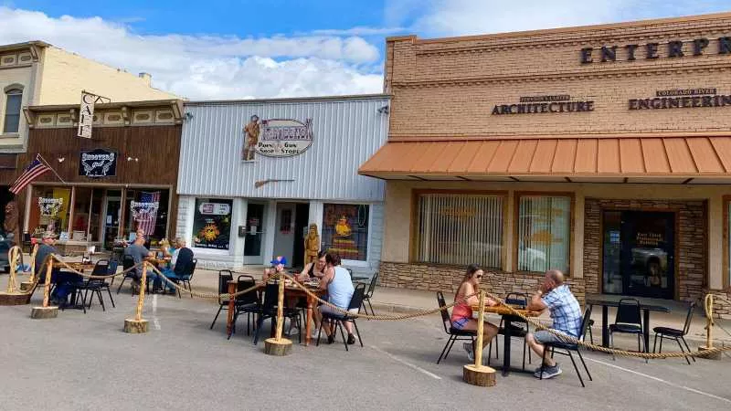 Image: Outside dining in front of Shooters Grill in Rifle prior to its May 15 closure.