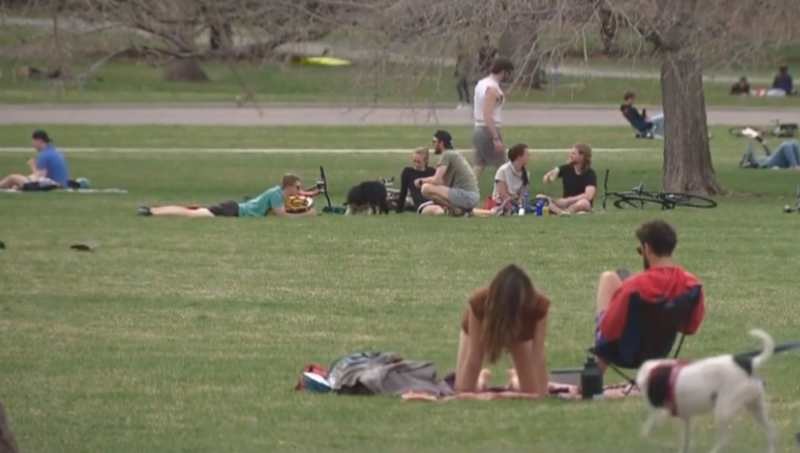 Only a relative handful of folks visiting Cheesman Park on April 5 were wearing masks.